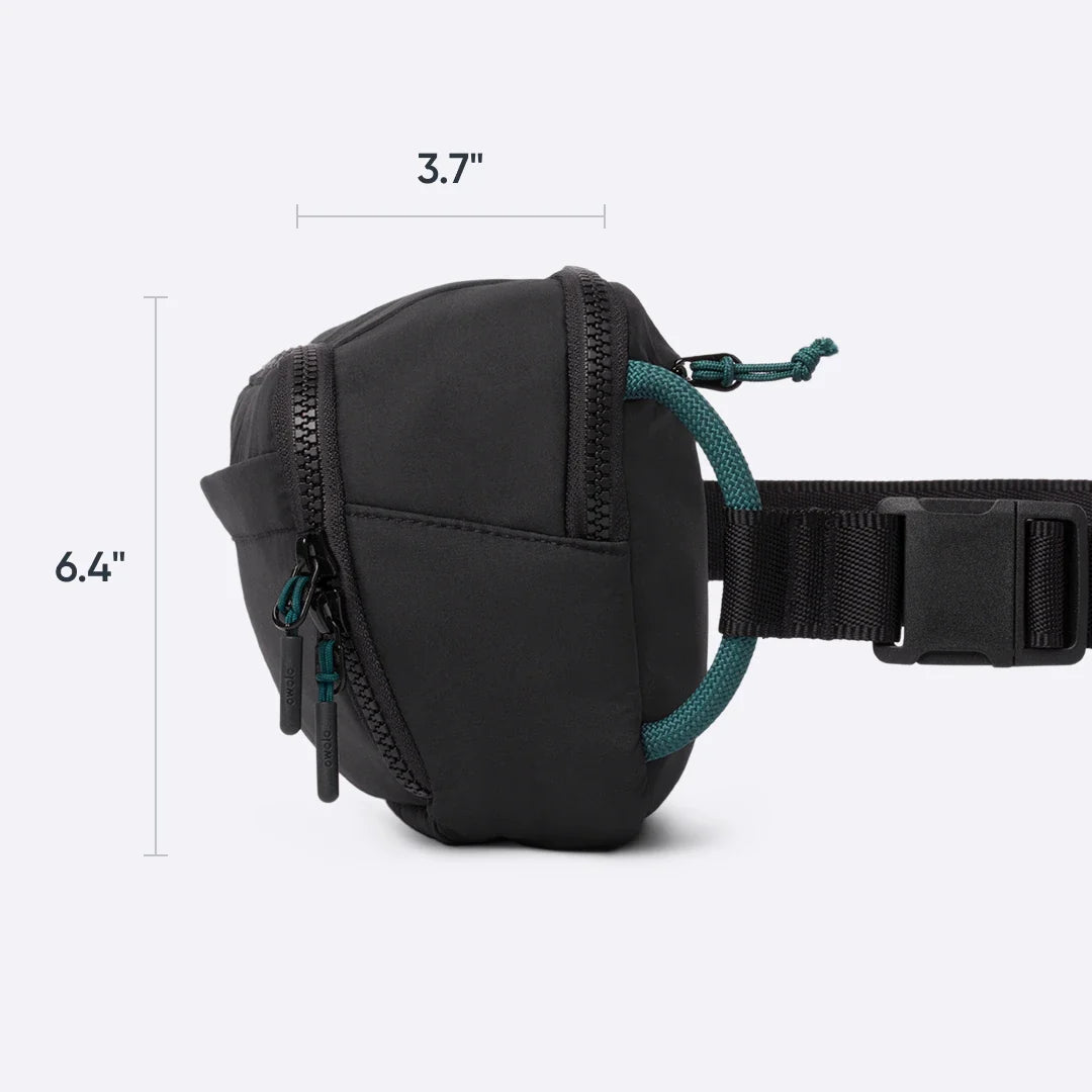 Owala All-Day Crossbody in Midnight Snack, side profile of the black ripstop body with teal paracord pull and adjustable strap, with dimensions 3.7 inches deep, 6.4 inches tall